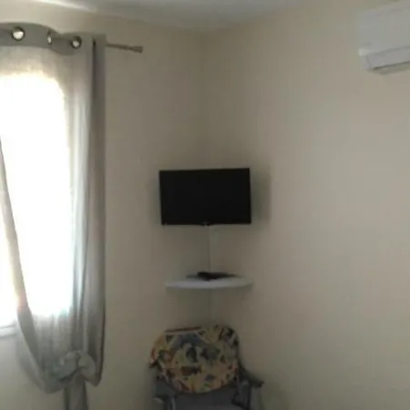 Quarto em Acomodações Particulares D'hotes Biguglia *